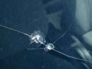 Windshield with two small rock chips