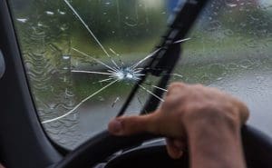 Large rock chip on car windshield